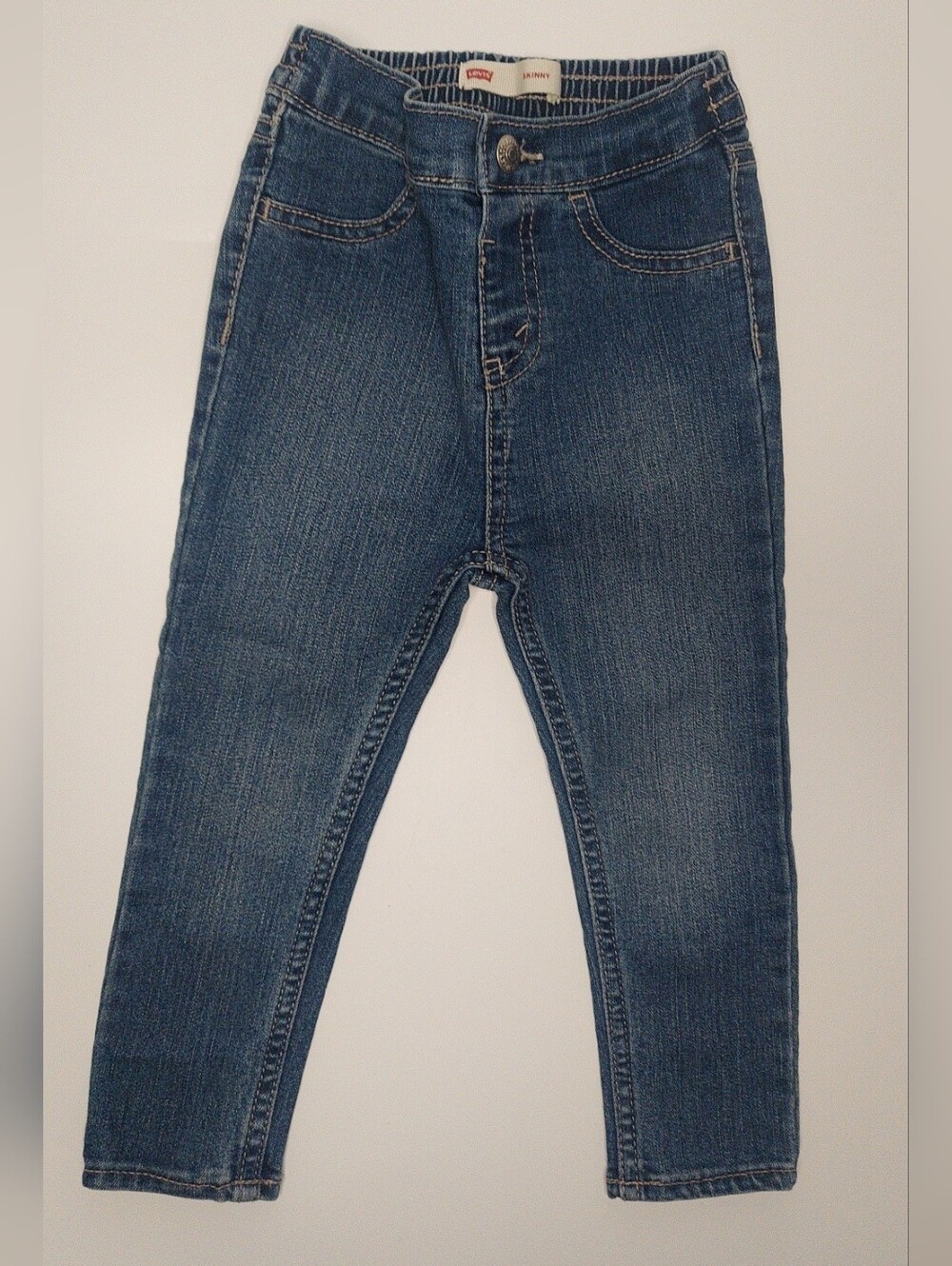 Kids Levi's blue denim jeans with red logo tab